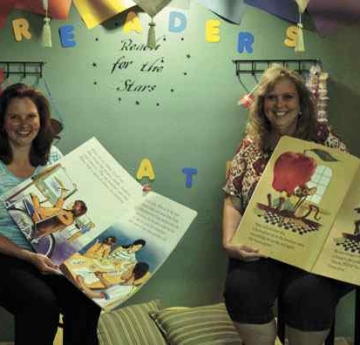 King and Miskell with books