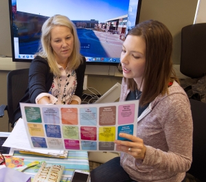 Students looking at a brochure