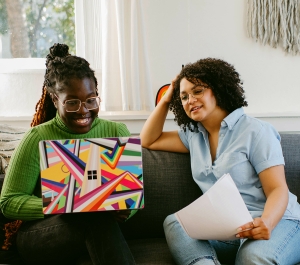 Two women on a couch